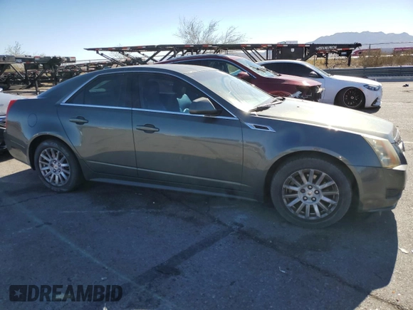 2011 Cadillac CTS with VIN 1G6DA5EY0B0153445, listed as a Copart auction lot 82058044 with 146,056 mi miles and Salvage title. Bid and sale history available at DreamBid. Image 4.