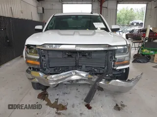 2018 Chevrolet Silverado 1500 LT with VIN 1GCRCREC0JZ204834, listed as a IAAI auction lot 41363579 with 135,247 mi miles and . Bid and sale history available at DreamBid. Image 6.