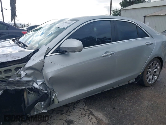 2018 Cadillac ATS Luxury RWD z VIN 1G6AB5RX6J0110860, wystawiony jako IAAI lot #41556662 z przebiegiem 63 886 mil mil oraz . Historia ofert i sprzedaży dostępna na DreamBid. Obrazek 6.