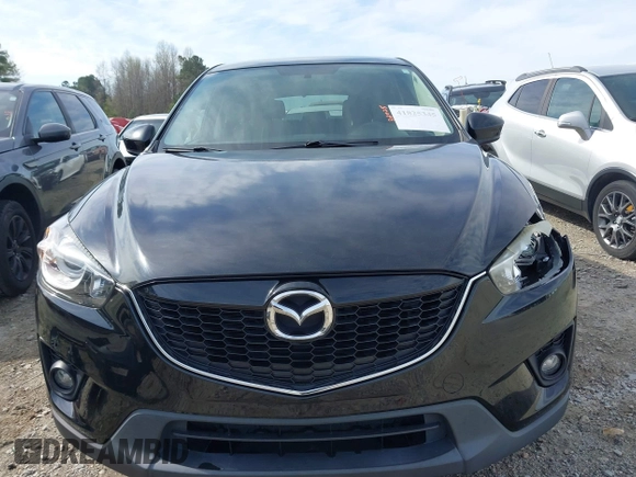 2014 Mazda CX-5 Touring with VIN JM3KE2CY9E0333951, listed as a IAAI auction lot 41825345 with 124,684 mi miles. Bid and sale history available at carsss.com. Image 12.