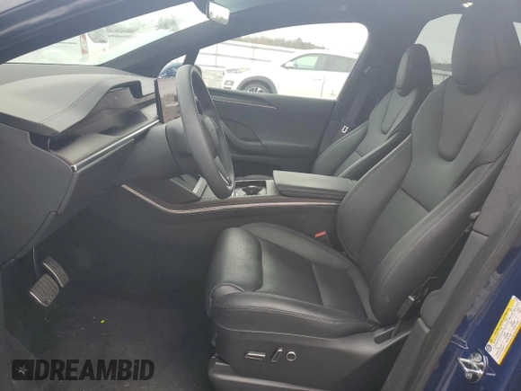 2023 Tesla Model X with VIN 7SAXCDE50PF430739, listed as a Copart auction lot 43069745 with 13,942 mi miles and Salvage Title. Bid and sale history available at DreamBid. Image 7.