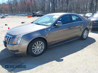2012 Cadillac CTS with VIN 1G6DA5E51C0148519, listed as a IAAI auction lot 41898211 with 92,220 mi miles and . Bid and sale history available at DreamBid. Image 2.