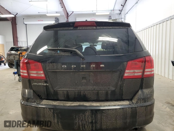 2017 Dodge Journey SE with VIN 3C4PDCAB4HT704902, listed as a Copart auction lot 51410815 with 153,976 mi miles and Salvage Title. Bid and sale history available at DreamBid. Image 6.