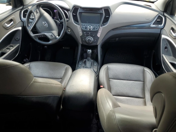2014 Hyundai Santa Fe with VIN 5XYZUDLBXEG198796, listed as a Copart auction lot 56596375 with 106,017 mi miles and Salvage title. Bid and sale history available at DreamBid. Image 8.