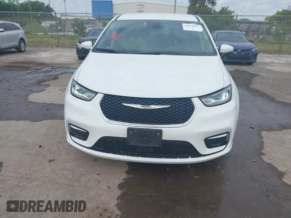 2023 Chrysler Pacifica Hybrid Touring L z VIN 2C4RC1L74PR541551, wystawiony jako IAAI lot #42028927 z przebiegiem 57 772 mil mil oraz . Historia ofert i sprzedaży dostępna na DreamBid. Obrazek 6.