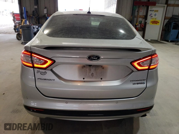 2016 Ford Fusion Titanium Hybrid with VIN 3FA6P0RUXGR355351, listed as a Copart auction lot 56516025 with 117,964 mi miles and Salvage title. Bid and sale history available at DreamBid. Image 6.