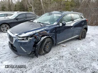 2018 Mazda CX-3 Grand Touring z VIN JM1DKFD73J0309811, wystawiony jako Copart lot #50003315 z przebiegiem 135 365 mil mil oraz Tytuł czysty. Historia ofert i sprzedaży dostępna na DreamBid. Obrazek 1.