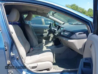 2010 Honda Insight LX with VIN JHMZE2H56AS013649, listed as a IAAI auction lot 42646690 with 5,593 mi miles and . Bid and sale history available at DreamBid. Image 5.