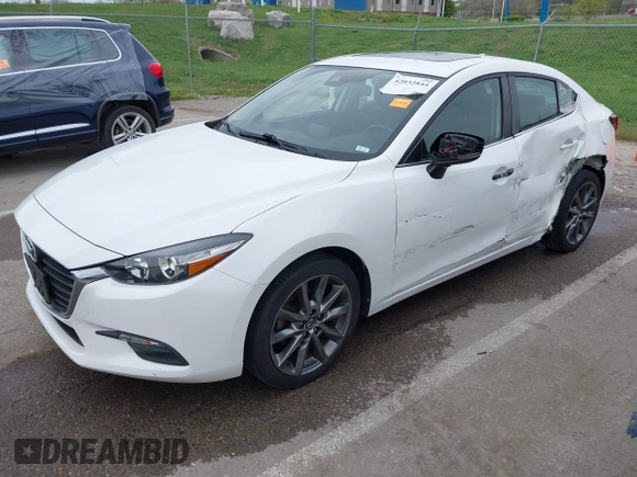 2018 Mazda 3 Touring with VIN 3MZBN1V32JM190611, listed as a IAAI auction lot 42032844 with 63,493 mi miles and . Bid and sale history available at DreamBid. Image 18.