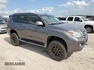 2012 Lexus GX 460 Premium with VIN JTJJM7FX2C5040932, listed as a Copart auction lot 58431725 with 130,995 mi miles and Salvage title. Bid and sale history available at DreamBid. Image 4.