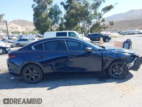 2021 Mazda 3 S with VIN JM1BPAALXM1326956, listed as a IAAI auction lot 42304248 with 55,104 mi miles and . Bid and sale history available at DreamBid. Image 14.