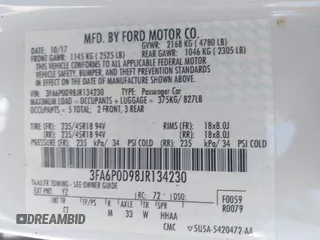 2018 Ford Fusion Titanium with VIN 3FA6P0D98JR134230, listed as a IAAI auction lot 42567084 with 107,459 mi miles and . Bid and sale history available at DreamBid. Image 9.