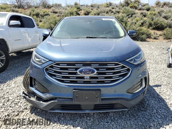 2019 Ford Edge Titanium z VIN 2FMPK4K91KBB81098, wystawiony jako Copart lot #53604115 z przebiegiem 70 179 mil mil oraz Szkoda całkowita • Salvage title. Historia ofert i sprzedaży dostępna na DreamBid. Obrazek 5.