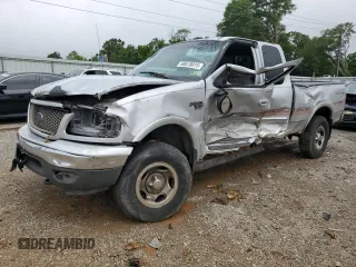 2002 Ford F-150 XL with VIN 1FTRX18W12NB58094, listed as a Copart auction lot 60618015 with Not provided miles and Salvage title. Bid and sale history available at DreamBid. Image 1.