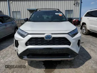 2023 Toyota RAV4 Hybrid XSE with VIN 2T3E6RFVXPW040152, listed as a Copart auction lot 61645565 with 26,408 mi miles and Salvage title. Bid and sale history available at DreamBid. Image 5.