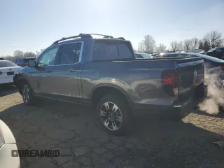 2020 Honda Ridgeline RTL with VIN 5FPYK3F5XLB031710, listed as a Copart auction lot 48028585 with 62,478 mi miles and Salvage title. Bid and sale history available at DreamBid. Image 2.