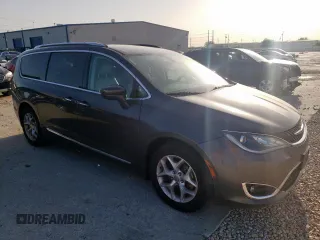 2017 Chrysler Pacifica Touring L Plus с VIN 2C4RC1EG7HR578348, выставлен на аукционе Copart как лот 57401415 с пробегом 158 176 миль миль и Списание • Salvage title. История ставок и продаж доступна на DreamBid. Изображение 4.