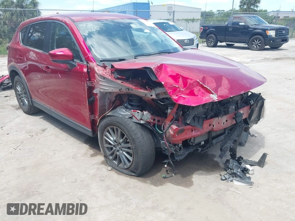 2019 Mazda CX-5 Touring with VIN JM3KFACM6K1549234, listed as a IAAI auction lot 42036633 with 85,065 mi miles and . Bid and sale history available at carsss.com. Image 1.