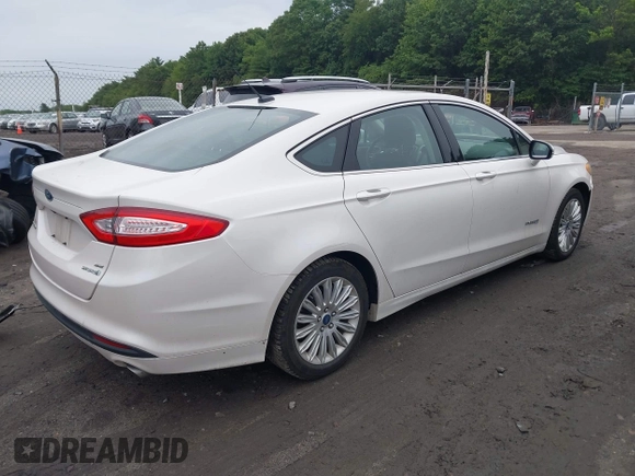2013 Ford Fusion SE Hybrid with VIN 3FA6P0LU0DR128688, listed as a IAAI auction lot 42580852 with 137,421 mi miles and . Bid and sale history available at DreamBid. Image 4.