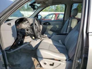 2005 Chevrolet TrailBlazer LS with VIN 1GNET16S656137810, listed as a Copart auction lot 69522694 with 126,768 mi miles and Salvage Title. Bid and sale history available at carsss.com. Image 7.