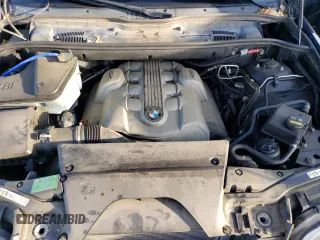 2005 BMW X5 4.8is with VIN 5UXFA935X5LE83006, listed as a Copart auction lot 49554885 with 160,136 mi miles and Clean Title. Bid and sale history available at carsss.com. Image 12.