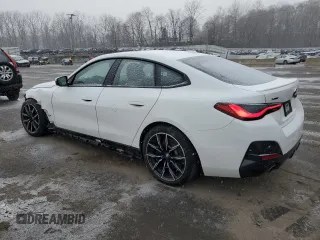 2023 BMW 4 Series 430i xDrive with VIN WBA73AV03PFP03200, listed as a Copart auction lot 87922935 with 44,003 mi miles and Salvage title. Bid and sale history available at DreamBid. Image 2.