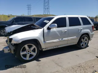 2005 Jeep Grand Cherokee Limited with VIN 1J8HR58235C704767, listed as a Copart auction lot 54436665 with 114,430 mi miles and Salvage title. Bid and sale history available at DreamBid. Image 1.