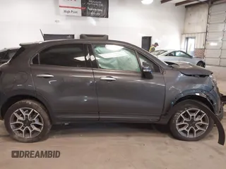 2021 FIAT 500X Trekking with VIN ZFBNF3B17MP909591, listed as a IAAI auction lot 41256551 with 58,688 mi miles and . Bid and sale history available at DreamBid. Image 13.