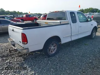 1998 Ford F-150 with VIN 1FTZX1764WNB15831, listed as a IAAI auction lot 42529692 with 149,677 mi miles and . Bid and sale history available at DreamBid. Image 4.