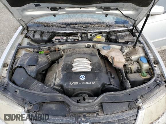 2000 Volkswagen Passat z VIN WVWRH23B6YE274455, wystawiony jako Copart lot #81634704 z przebiegiem 154 076 mil mil oraz Czysty tytuł • Clean title. Historia ofert i sprzedaży dostępna na DreamBid. Obrazek 12.