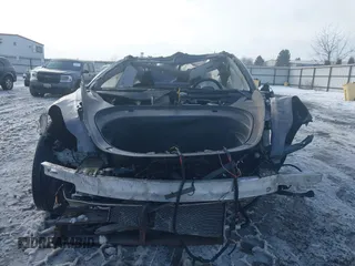 2020 Tesla Model 3 Long Range z VIN 5YJ3E1EB9LF787390, wystawiony jako IAAI lot #41614394 z przebiegiem Nie podano mil oraz . Historia ofert i sprzedaży dostępna na DreamBid. Obrazek 11.