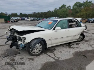 2004 Acura RL w/Navigation System with VIN JH4KA96684C001230, listed as a Copart auction lot 74801074 with 151,266 mi miles and Salvage Title. Bid and sale history available at carsss.com. Image 1.
