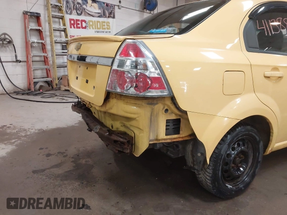 2010 Chevrolet Aveo 1LT z VIN KL1TD5DE2AB101431, wystawiony jako IAAI lot #41138812 z przebiegiem 131 346 mil mil oraz . Historia ofert i sprzedaży dostępna na DreamBid. Obrazek 18.