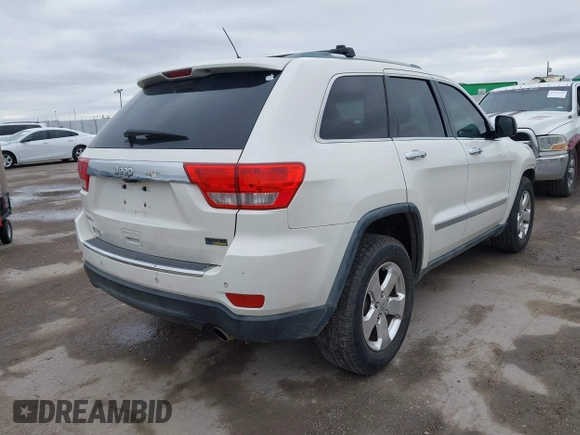 2012 Jeep Grand Cherokee Limited with VIN 1C4RJEBG4CC229571, listed as a IAAI auction lot 41565669 with 221,268 mi miles. Bid and sale history available at carsss.com. Image 4.