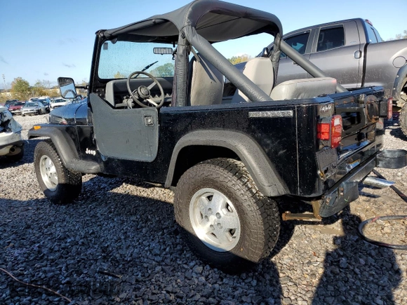 1989 Jeep Wrangler "S" with VIN 2J4FY19E9KJ162797, listed as a Copart auction lot 81404894 with 137,051 mi miles and Clean Title. Bid and sale history available at carsss.com. Image 2.