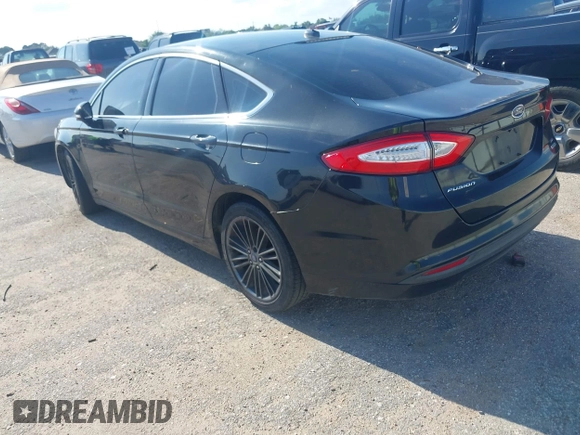 2014 Ford Fusion SE with VIN 3FA6P0HD4ER390773, listed as a IAAI auction lot 42088373 with 265,001 mi miles and . Bid and sale history available at DreamBid. Image 3.