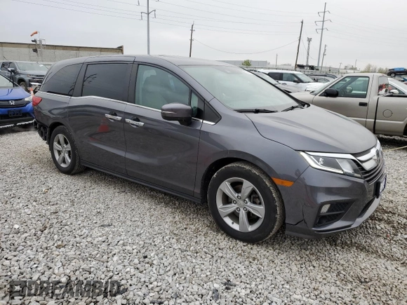 2018 Honda Odyssey EX-L with VIN 5FNRL6H78JB091153, listed as a Copart auction lot 52743715 with 69,849 mi miles and Salvage Title. Bid and sale history available at DreamBid. Image 4.