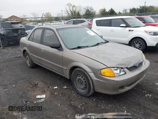 1999 Mazda Protege DX z VIN JM1BJ2226X0184189, wystawiony jako IAAI lot #41966252 z przebiegiem 226 890 mil mil oraz . Historia ofert i sprzedaży dostępna na DreamBid. Obrazek 1.