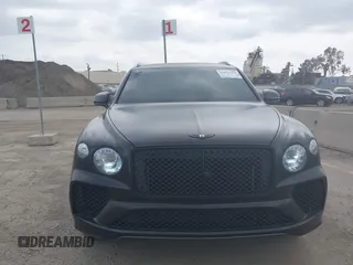 2021 Bentley Bentayga V8 z VIN SJAAM2ZV5MC038171, wystawiony jako IAAI lot #42057762 z przebiegiem 25 973 mil mil oraz . Historia ofert i sprzedaży dostępna na DreamBid. Obrazek 6.