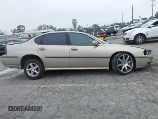 2003 Chevrolet Impala LS with VIN 2G1WH52K239353096, listed as a IAAI auction lot 41890556 with 149,065 mi miles and . Bid and sale history available at DreamBid. Image 13.