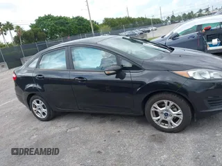 2015 Ford Fiesta SE with VIN 3FADP4BJ5FM130099, listed as a IAAI auction lot 42126960 with 82,299 mi miles and . Bid and sale history available at DreamBid. Image 13.