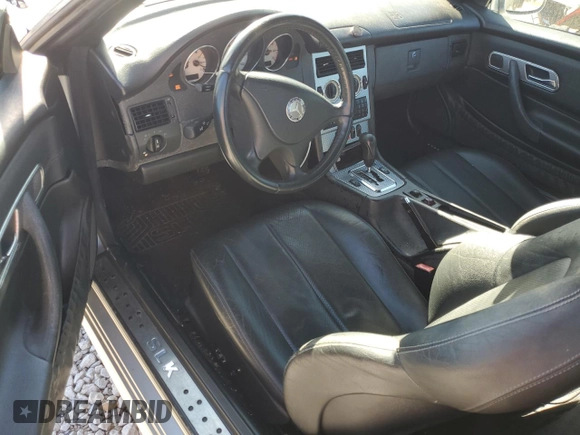 2001 Mercedes-Benz SLK 230 Kompressor z VIN WDBKK49F31F188527, wystawiony jako Copart lot #84489514 z przebiegiem 182 831 mil mil oraz Szkoda całkowita • Salvage title. Historia ofert i sprzedaży dostępna na DreamBid. Obrazek 8.