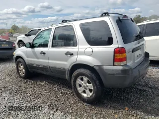 2005 Ford Escape XLS Value with VIN 1FMYU02Z85DA14324, listed as a Copart auction lot 73111164 with 212,118 mi miles and Salvage Title. Bid and sale history available at carsss.com. Image 2.