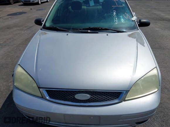 2006 Ford Focus S z VIN 1FAFP34N66W203290, wystawiony jako IAAI lot #42273443 z przebiegiem 193 482 mil mil oraz . Historia ofert i sprzedaży dostępna na DreamBid. Obrazek 10.