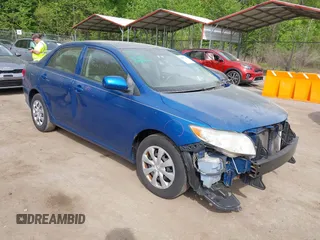 2009 Toyota Corolla with VIN JTDBL40EX99042235, listed as a IAAI auction lot 42097839 with 188,408 mi miles. Bid and sale history available at carsss.com. Image 1.