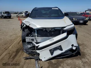 2023 Toyota bZ4X XLE with VIN JTMABACAXPA023864, listed as a Copart auction lot 60647154 with 6,588 mi miles and Salvage Title. Bid and sale history available at carsss.com. Image 5.
