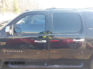 2007 Chevrolet Suburban LT with VIN 3GNFK16357G166135, listed as a IAAI auction lot 41880000 with 229,465 mi miles and . Bid and sale history available at DreamBid. Image 14.