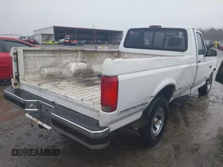 1994 Ford F-150 with VIN 1FTEF15N0RNA67826, listed as a IAAI auction lot 41547971 with 233,713 mi miles. Bid and sale history available at carsss.com. Image 4.