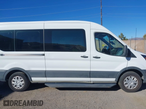 2019 Ford Transit with VIN 1FTYE2CM8KKB72492, listed as a IAAI auction lot 41371136 with 111,915 mi miles and . Bid and sale history available at DreamBid. Image 13.