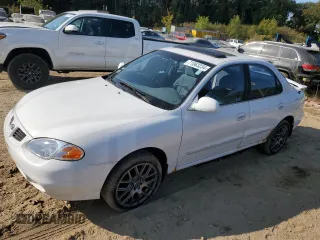 2000 Hyundai Elantra GLS z VIN KMHJF35F8YU922503, wystawiony jako Copart lot #71063234 z przebiegiem 209 706 mil mil oraz Czysty tytuł • Clean title. Historia ofert i sprzedaży dostępna na DreamBid. Obrazek 1.